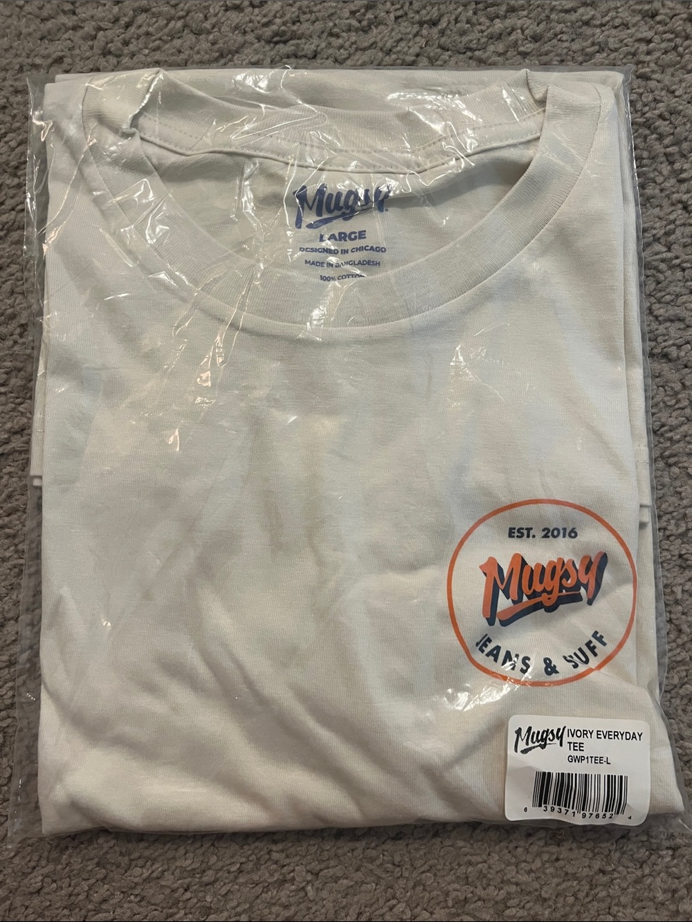 Mugsy Ivory Everyday Tee with Orange Logo
